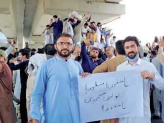 abuse of power by police not acceptable reads a placard displayed by protesters at a demonstration in peshawar photo express